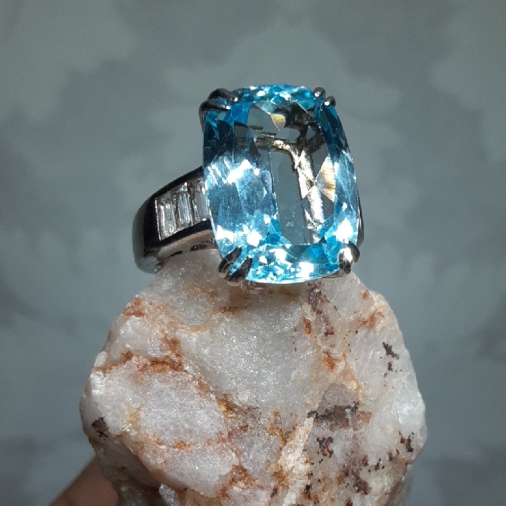 925 Genuine Blue And White Topaz Ring.